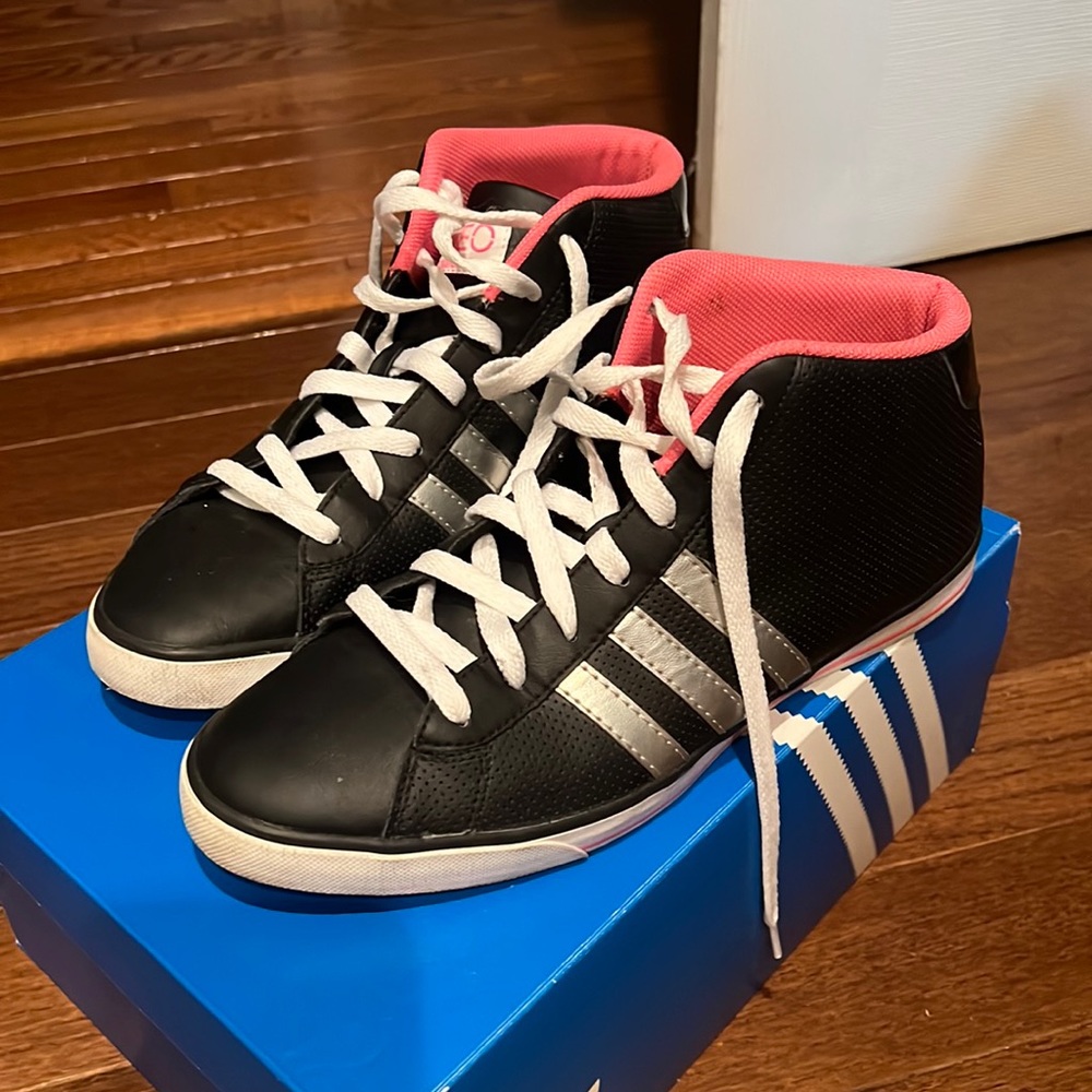 High top adidas with silver stripes, excellent used condition.